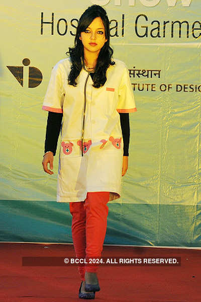Fashion show of medical garments and equipments