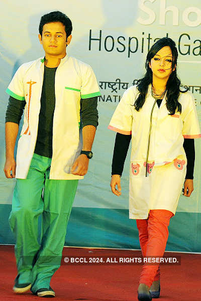 Fashion show of medical garments and equipments