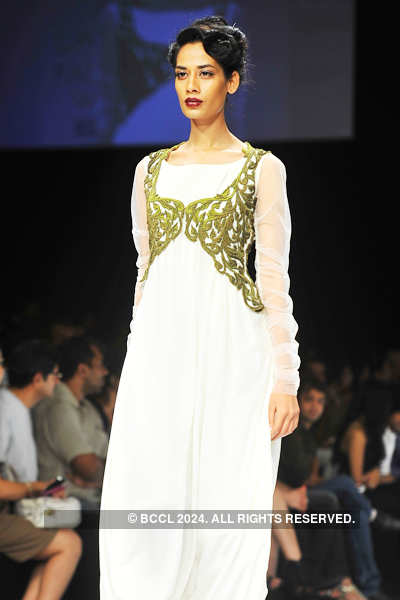 Model Alecia Raut showcases a creation by designers Kartikeya and Isha ...