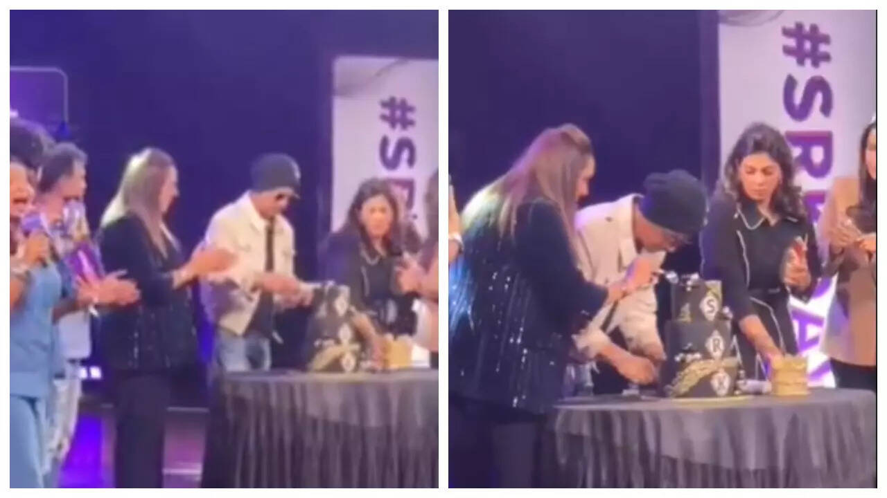 Shah Rukh Khan cutting his birthday cake