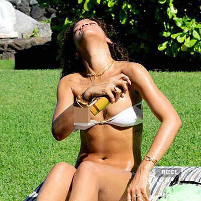Rihanna goes topless in sexy Hawaii holiday pics
