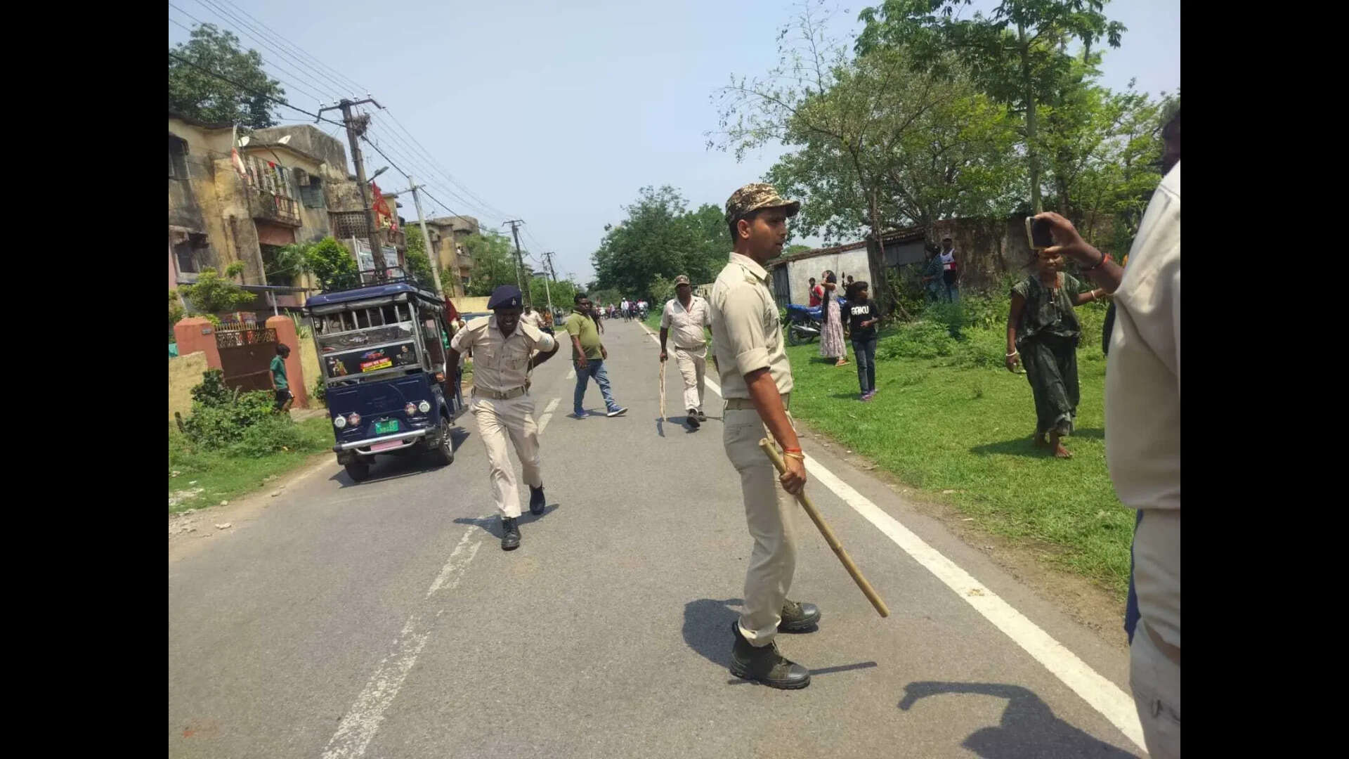 2 home guards hurt as squatters resist eviction drive near airport