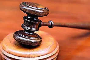 Ex-MCG official acquitted in decade-old bribery case