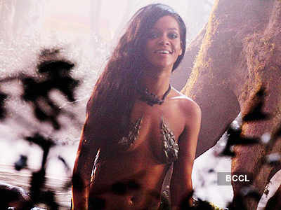 Rihanna poses topless for video