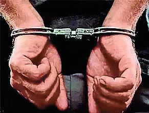 Bouncer held on charge of flashing woman