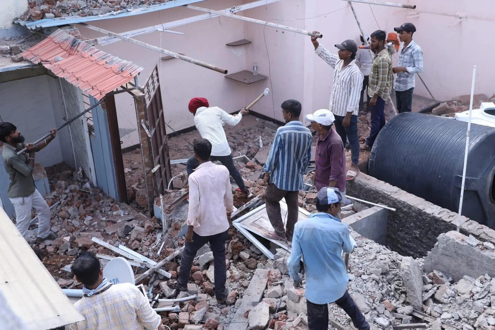 PCMC demolishes illegal residential structure linked to hooch tragedy accused in Phugewadi