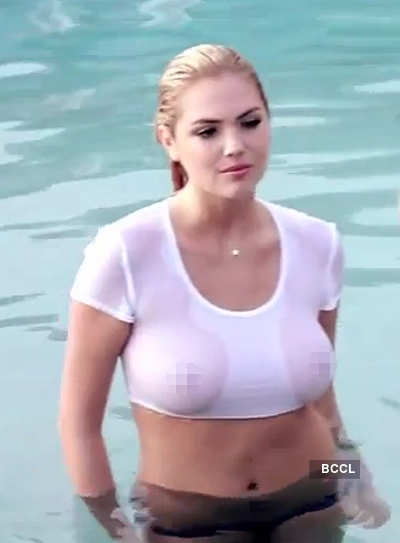 Kate Upton is one of the most famous bikini models in the world on account of her assets, is seen doing her best all-American girl impression while wearing as little as