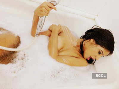 Poonam in a bath tub