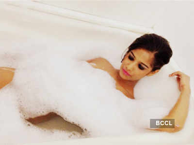 Poonam in a bath tub