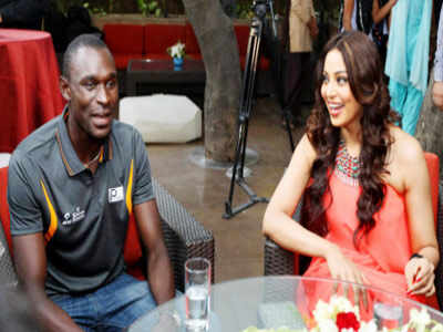 Bipasha Basu with school kids