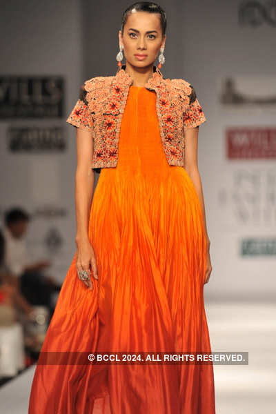 Candice Pinto displays a creation by designer Samant Chauhan on Day 2 ...