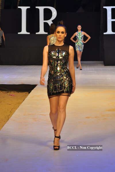 Models display the creation of Shane and Falguni on the ramp on Day 4 ...