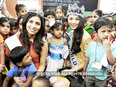 Vanya visits school with Miss World
