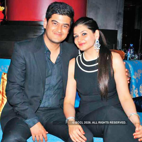 Golfers putt on party hats