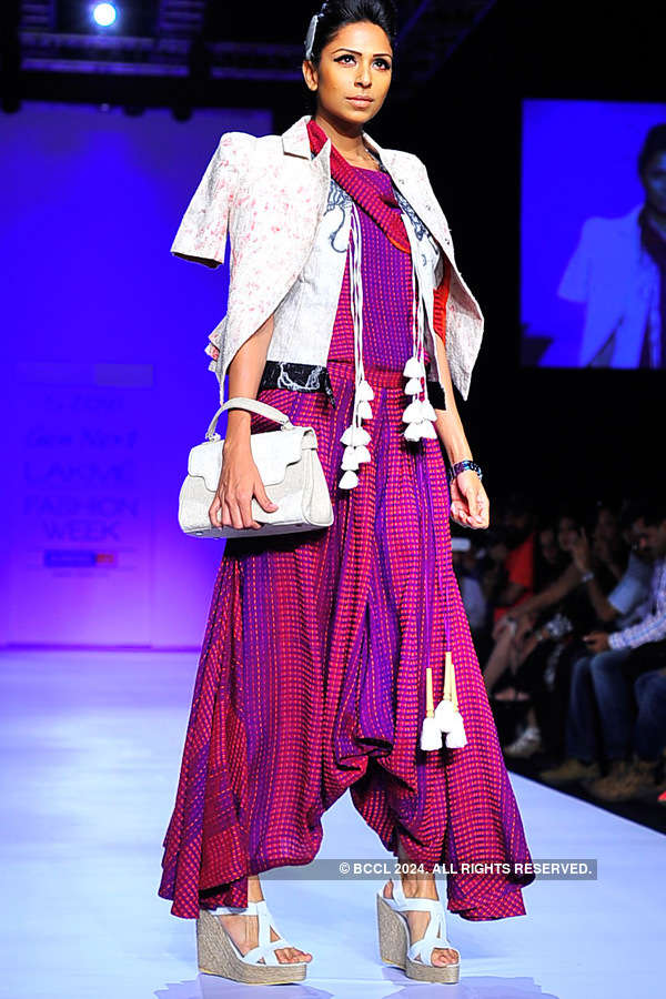 A model showcases a creation by Zovi Gen Next on Day 2 of the Lakme ...