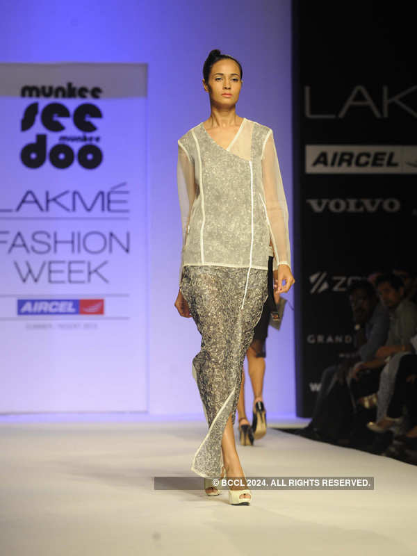 A model walks the ramp for fashion designers Teresa Laisom and Utsav ...
