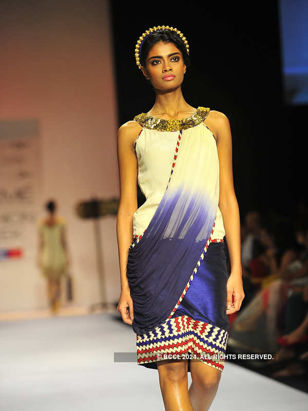 A model showcases a creation by designer Pallavi Jaipur on Day 6 of the ...