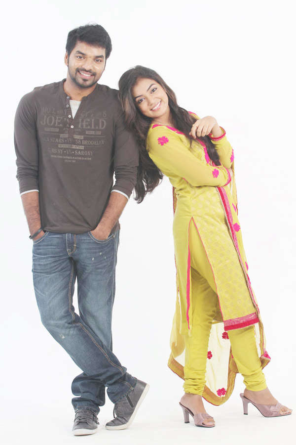 Jai and Nazriya Nazeem in a still from the Tamil movie Thirumana Ennum ...
