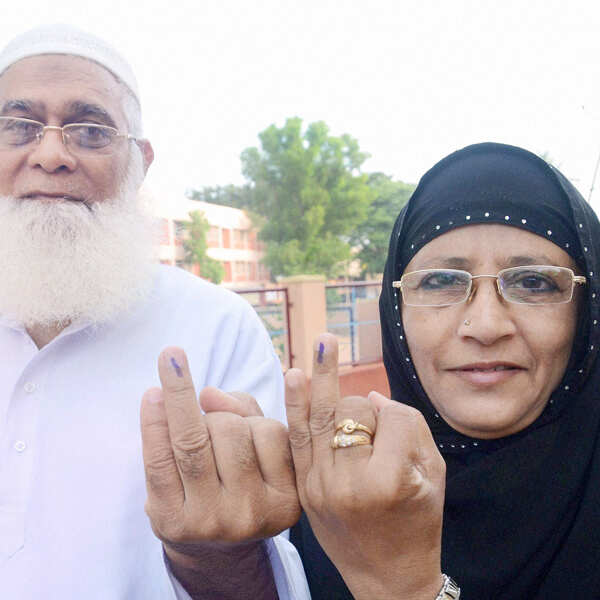 An old Muslim couple after casting vote for Karnataka Assembly polls in  Hubli,