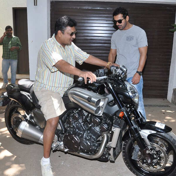 John gifts bike to Sanjay