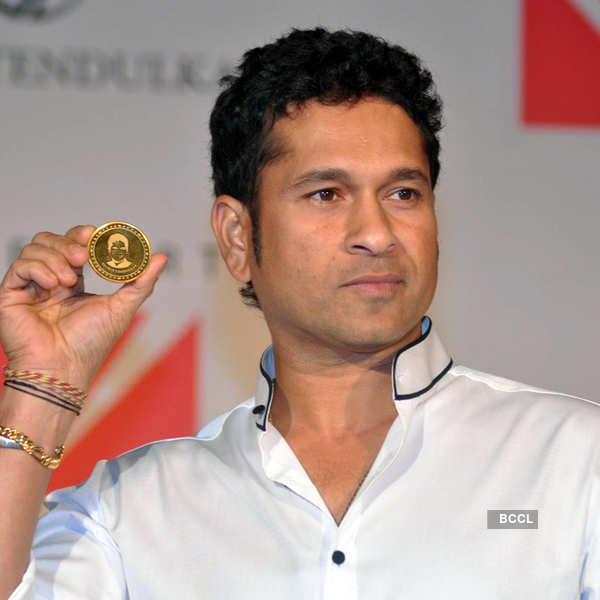 Sachin unveils gold coin