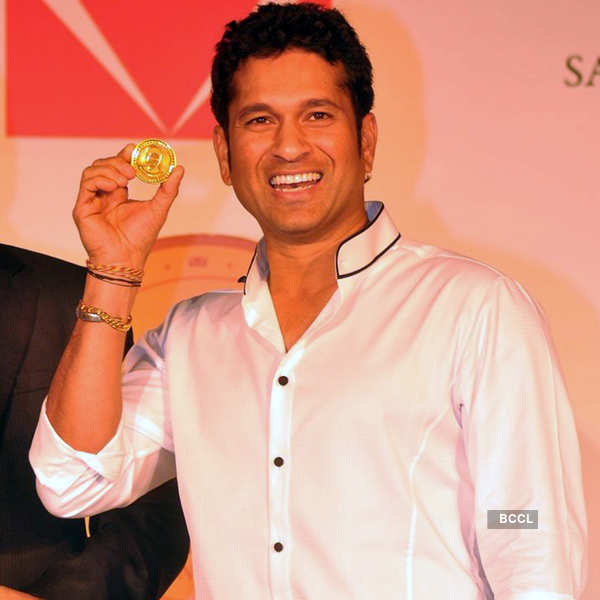 Sachin unveils gold coin
