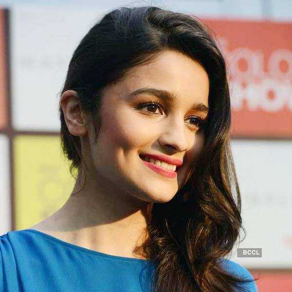Dimpled beauty Alia Bhatt strikes a pose for the flashbulbs during the  launch of Color Show