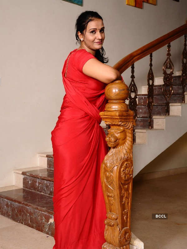 South Indian Siren Apoorva Poses In A Red Saree During A Photoshoot