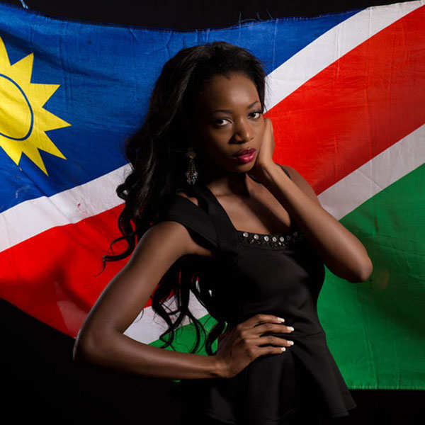 Miss Universe contestants pose with their national flags