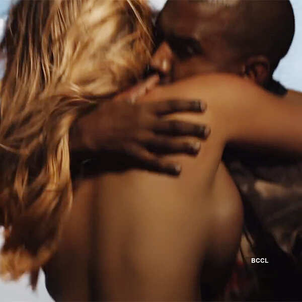 Kim Kardashian goes topless in Kanye's video