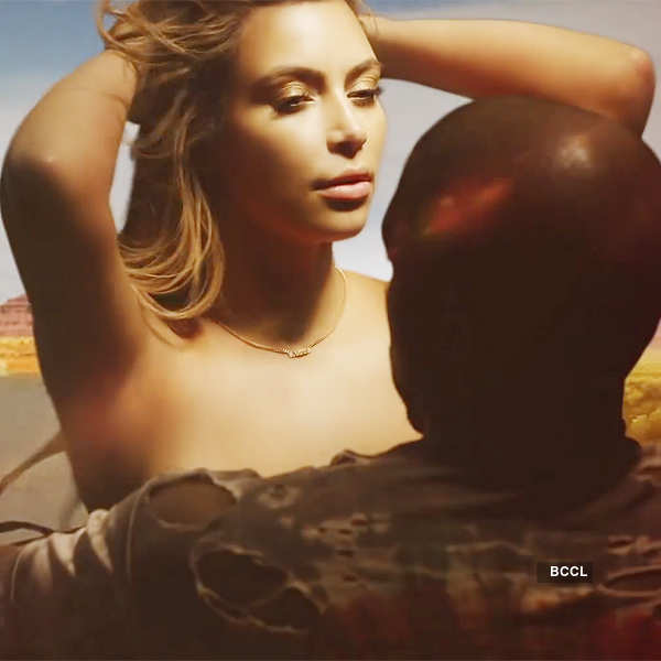 Kim Kardashian goes topless in Kanye's video