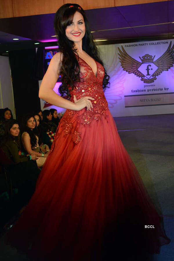 Elli Avram walks the ramp