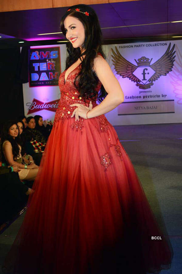Elli Avram walks the ramp