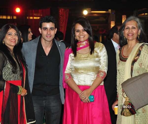 Gautam Rode poses with guests during the sangeet ceremony.