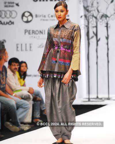 Ekta Chowdhry displays an outfit from designer Niki Mahajan's fall ...