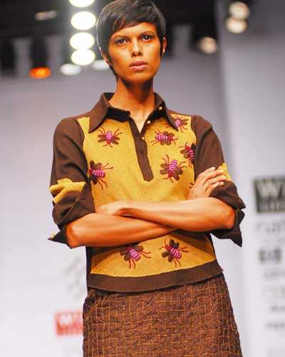 Shubhra Aiyappa displays an outfit from designer Rahul Reddy’s fall ...