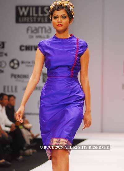 A model displays an outfit from designer Rehane's fall/winter ...