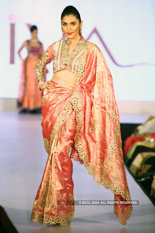 Deepti Gujral walks the ramp during a wedding-inspired fashion show ...
