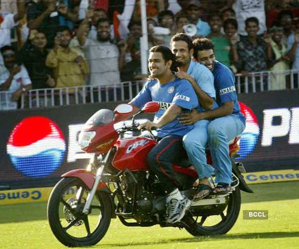mahendra singh dhoni images with bike
