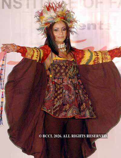 A model walks the ramp at Anu Kama's fashion show held at Mohali ...