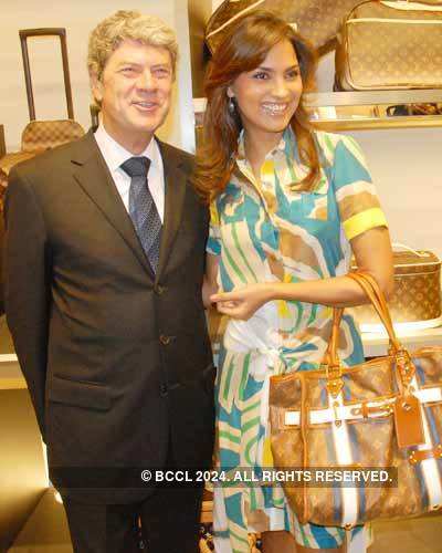 Actress Lara Dutta (R) with Yves Carcelle (L), Chairman and CEO