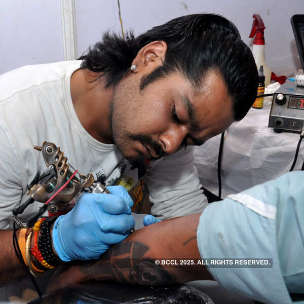 Anand Verma during a tattoo expo for charity was held at a community hall  in Deshapriya Park, Kolkata.