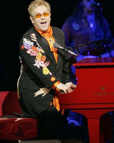 Elton John performs