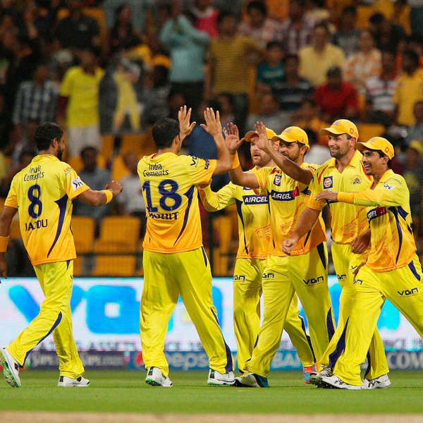 Chennai Super Kings celebrate the wicket of James Neesham of the Delhi  Daredevils during the IPL-7 match at the Zayed Cricket Stadium in Sharjah,  United Arab Emirates, on April 21, 2014.