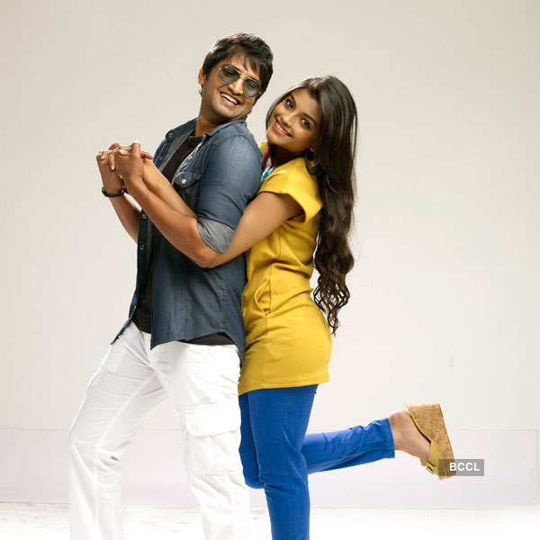 Ashna Zaveri and Santhanam in a still from the Tamil movie Vallavanukku ...