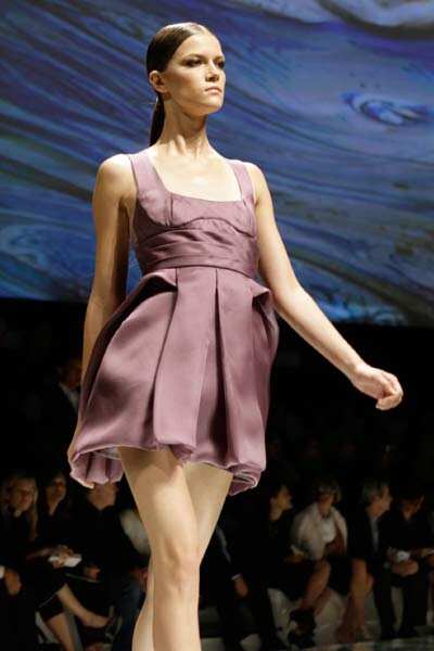 A model wears a creation part of the Versace Spring/Summer 2009 fashion ...