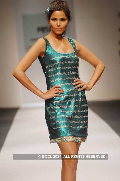 Poonam Nath showcases a creation from designer Abhijeet Khanna's