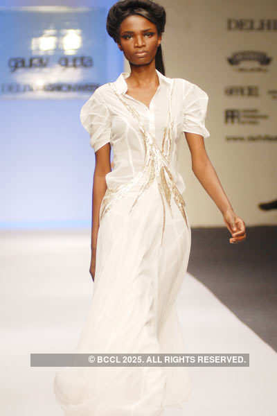 Malvika displays a creation by designer Gaurav Gupta during Delhi ...