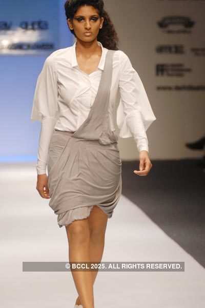 Malvika displays a creation by designer Gaurav Gupta during Delhi ...