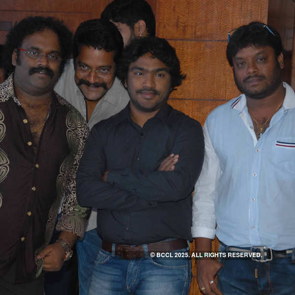 V Harikrishna, Ravishankar and Arjun Janya during the Adhyaksha audio ...